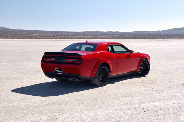 2019 Dodge Challenger Scat Pack Widebody, rear three-quarter view in red on salt flat