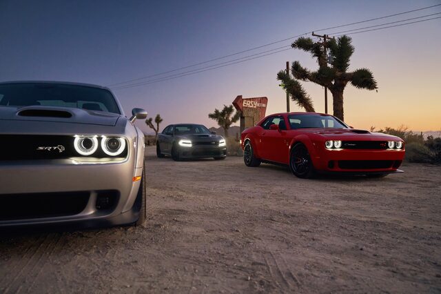 2019 Dodge Challenger SRT, three-car nighttime lineup at Joshua Tree desert location