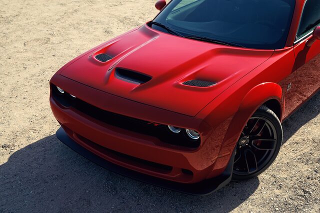 2019 Dodge Challenger Scat Pack, overhead front closeup of hood scoops in red