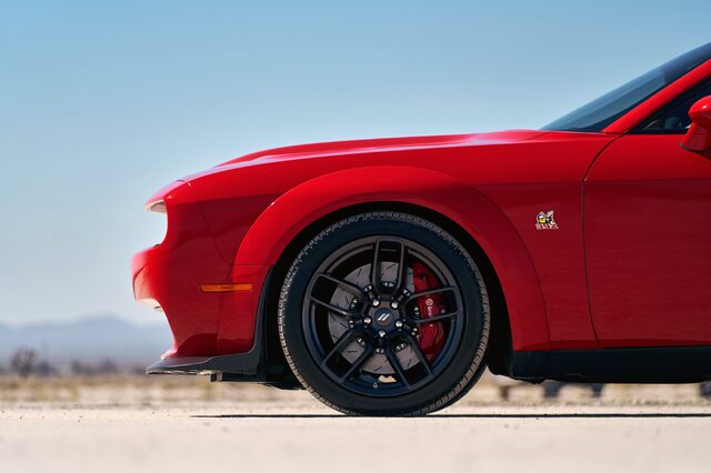 2019 Dodge Challenger SRT Hellcat Widebody, front wheel and brake caliper closeup in red
