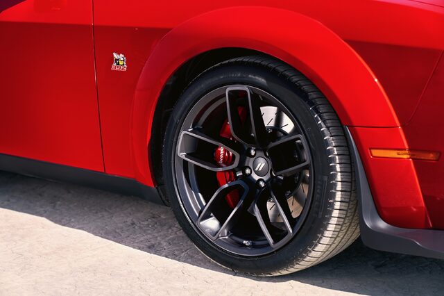 2019 Dodge Challenger Scat Pack, rear wheel and red Brembo brake caliper closeup
