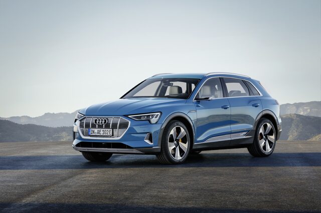 2019 Audi e-tron quattro front three-quarter view tarmac mountain setting