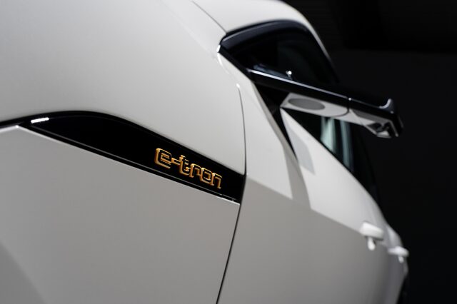 2019 Audi e-tron gold e-tron badge and virtual mirror closeup detail
