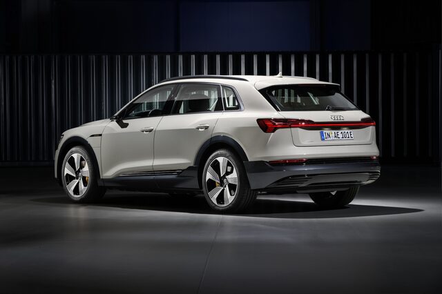 2019 Audi e-tron quattro rear three-quarter view studio Siam beige