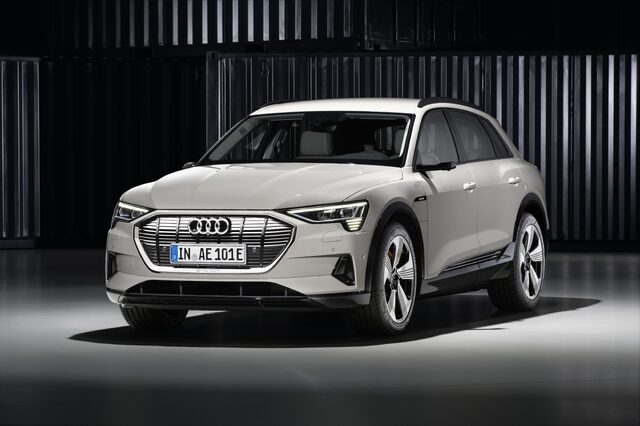 2019 Audi e-tron quattro front three-quarter view studio white