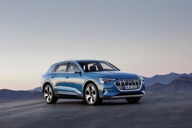 2019 Audi e-tron quattro front three-quarter view mountain backdrop