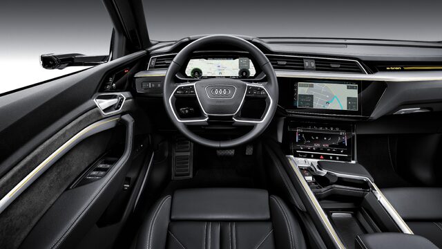 2019 Audi e-tron interior steering wheel and dual MMI display closeup
