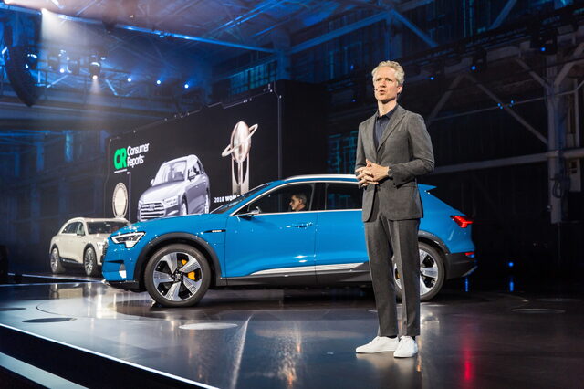 2019 Audi e-tron Antigua Blue on premiere stage with Consumer Reports mention