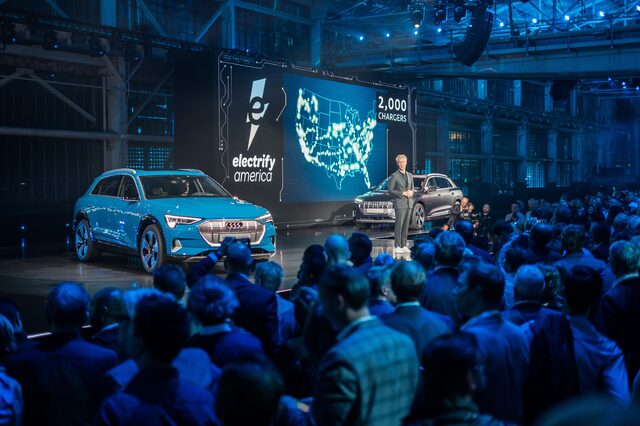 2019 Audi e-tron premiere event stage with Electrify America 2000 chargers slide