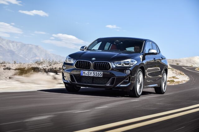 2019 BMW X2 M35i driving on curving desert road