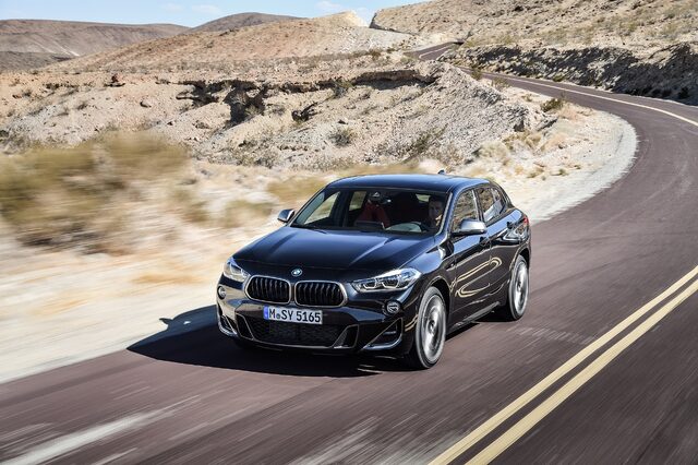 2019 BMW X2 M35i cornering on winding desert road