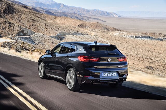 2019 BMW X2 M35i rear three-quarter view on desert mountain road