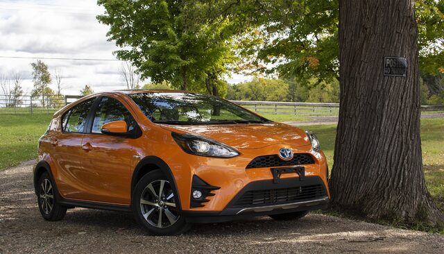 2018 Toyota Prius C Four front three-quarter view orange
