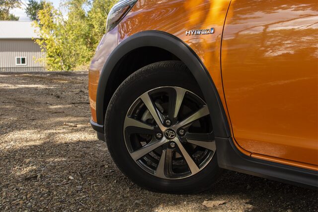 2018 Toyota Prius C Four wheel and Hybrid badge detail