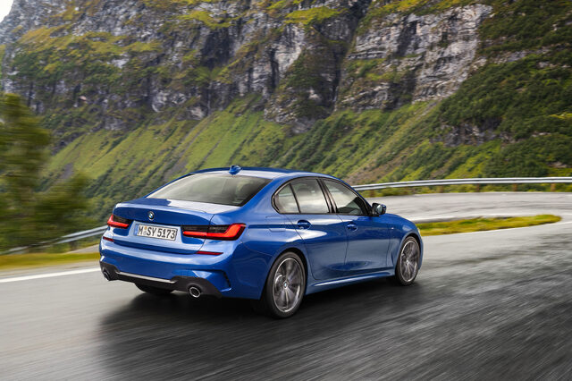 2019 BMW 3 Series M Sport [rear view driving fast]