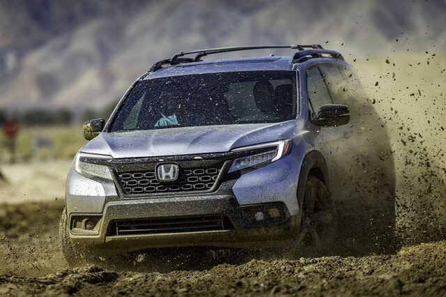 07_2019_Honda_Passport_with_Accessory_Roof_Rack,_Running_Boards_and_Fender_Flares.jpg
