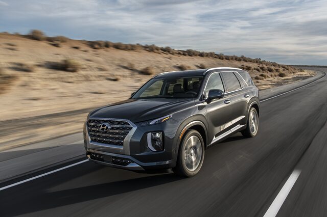 2020 Hyundai Palisade [front three-quarter driving canyon]