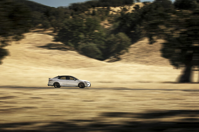 2020 Toyota Camry TRD Side Profile Panning Shot Against Golden California Hills