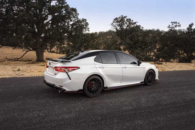 2020 Toyota Camry TRD Rear Three-Quarter View Showing TRD Wheels and Side Rocker