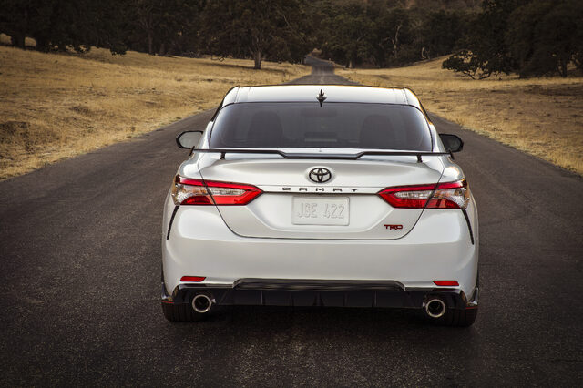 2020 Toyota Camry TRD Rear View on Country Road Showing Spoiler and Diffuser