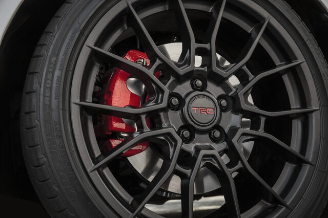 2020 Toyota Camry TRD Wheel Detail with Red Brake Caliper and TRD Center Cap