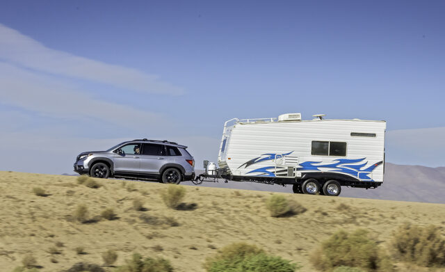 09.1_2019_Honda_Passport_with_Accessory_Roof_Rack,_Running_Boards,_Fender_Flares_and_Towing_Hitch.jpg