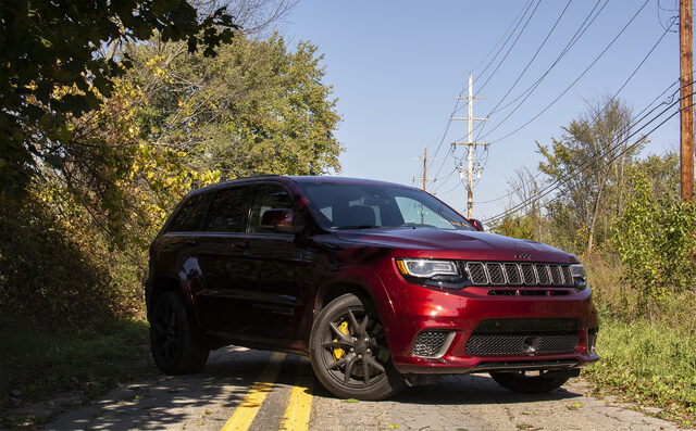 2018 Jeep Grand Cherokee SRT Trackhawk three-quarter front angle with fall foliage