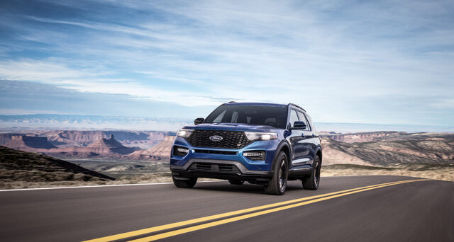 2020 Ford Explorer ST Front Three-Quarter View Driving Canyon Mesa Road Blue Exterior