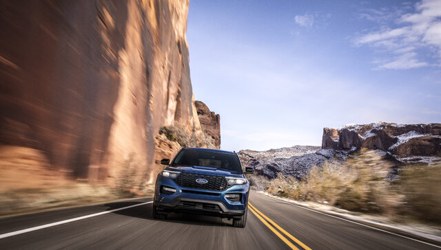 2020 Ford Explorer ST Front View Driving Red Rock Canyon Road Motion Blur Blue Exterior