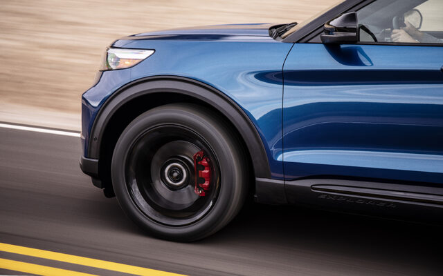 2020 Ford Explorer ST Wheel Close-Up Motion Blur Black Spoke Red Brake Caliper Blue Exterior