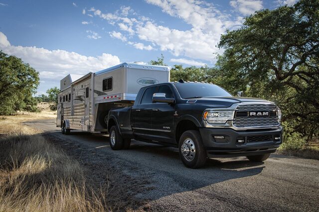 2020 RAM 3500 HD towing horse trailer [front 3/4]