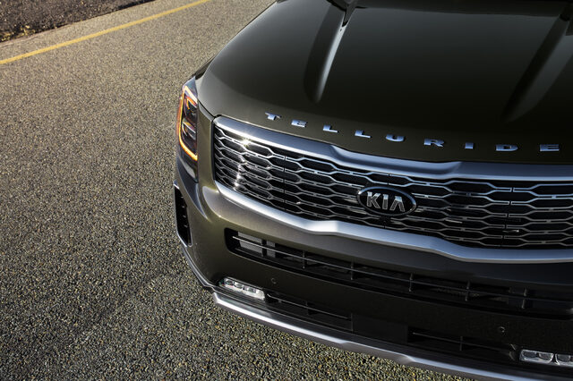 2020 Kia Telluride EX front grille and hood detail in dark olive