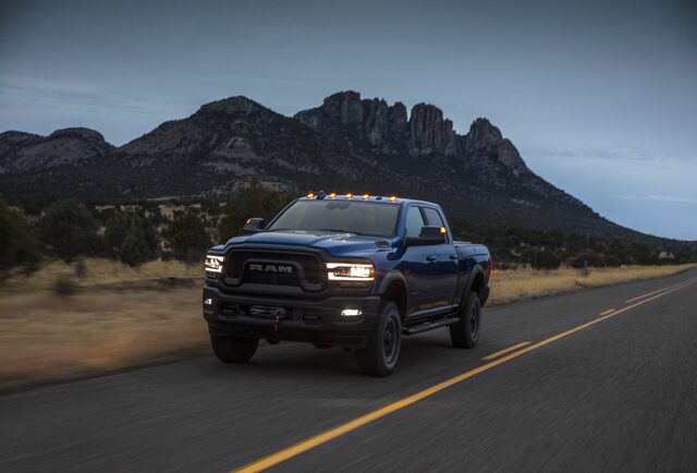 2020 RAM 2500 Power Wagon driving [front 3/4 dusk road]