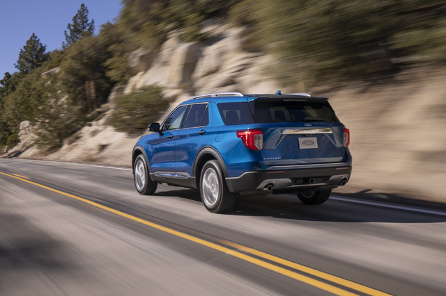 2020 Ford Explorer Limited rear three-quarter view driving on mountain road