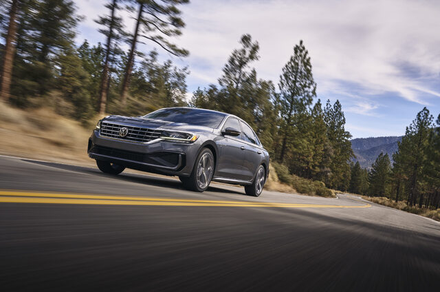 2020 Volkswagen Passat Front Three-Quarter Driving Shot Mountain Road