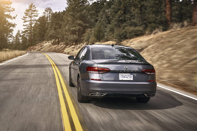 2020 Volkswagen Passat rear direct view on mountain highway