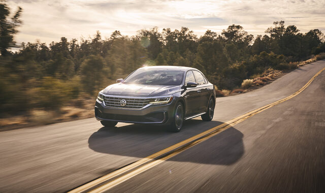 2020 Volkswagen Passat front three-quarter driving shot on open road
