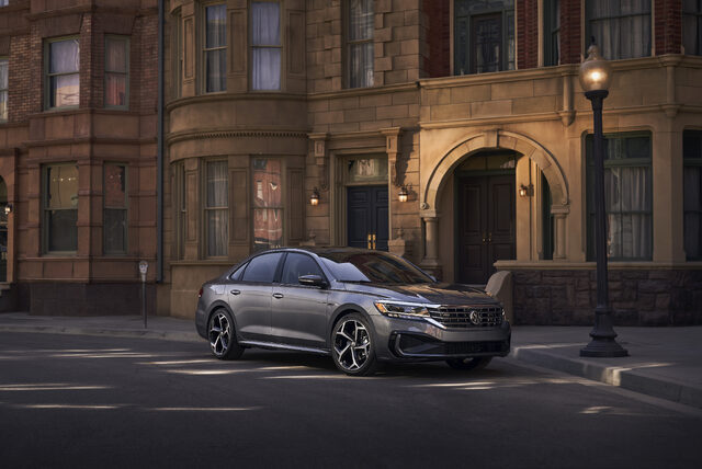 2020 Volkswagen Passat front three-quarter parked on city street at night