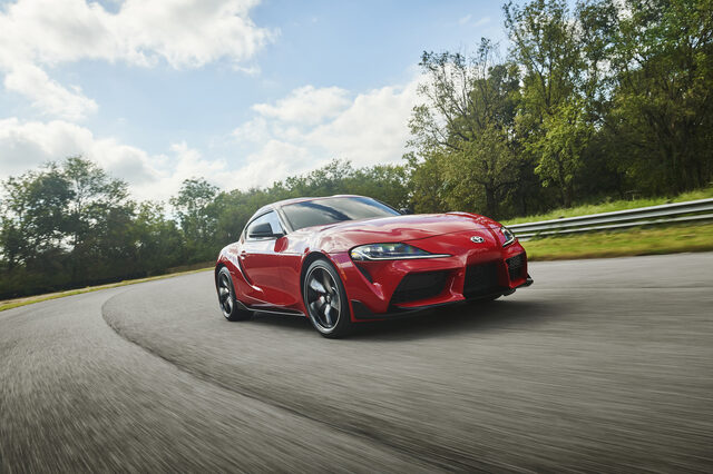 2020 Toyota GR Supra red front three-quarter cornering on track curve