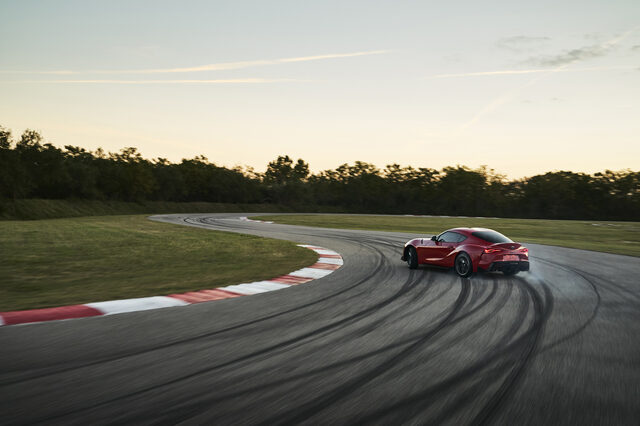 2020 Toyota GR Supra Cornering at Race Track at Dusk