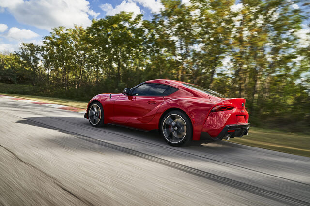 2020 Toyota GR Supra Rear Three-Quarter Pan Shot at Speed on Track