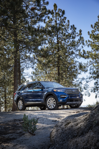 2020 Ford Explorer Limited front view parked on rocky forest overlook