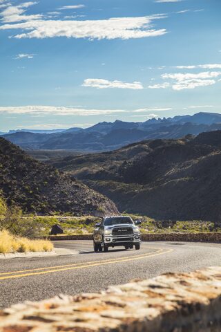 2020 RAM 2500 HD driving [front 3/4 mountain road]