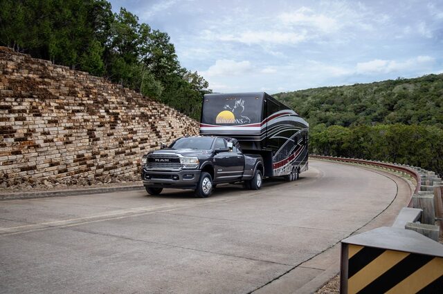 2020 RAM 3500 HD towing RV [front 3/4 highway]