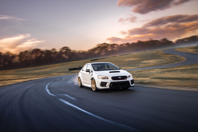 2019 Subaru WRX STi S209, front three-quarter action shot on track