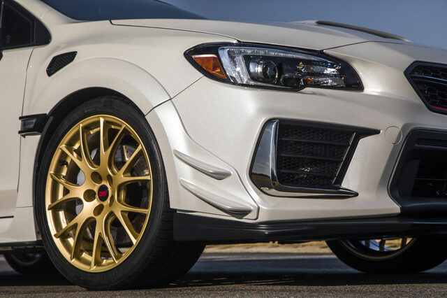2019 Subaru WRX STi S209, front corner detail with BBS gold wheel and headlight