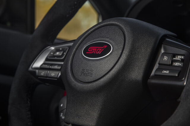 2019 Subaru WRX STi S209, STI steering wheel badge closeup