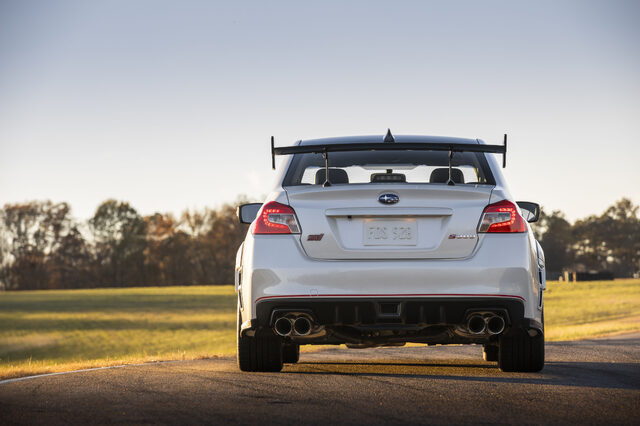 2019 Subaru WRX STi S209, direct rear static view showing full wing and quad exhaust