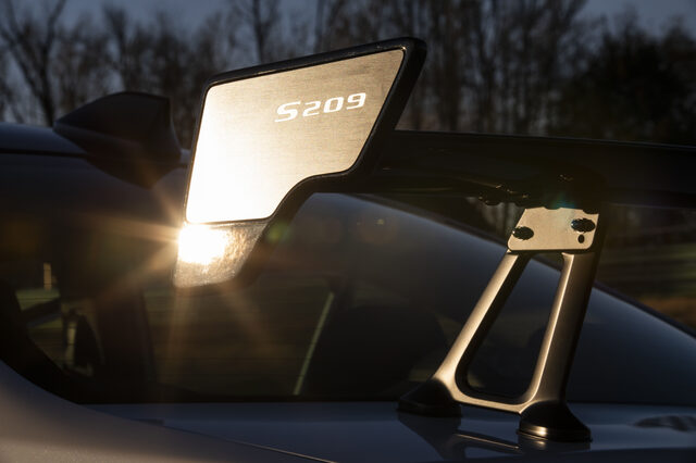 2019 Subaru WRX STi S209, carbon fiber rear wing with S209 lettering at dusk