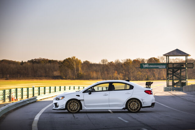 2019 Subaru WRX STi S209, full side profile static at VIR with timing tower